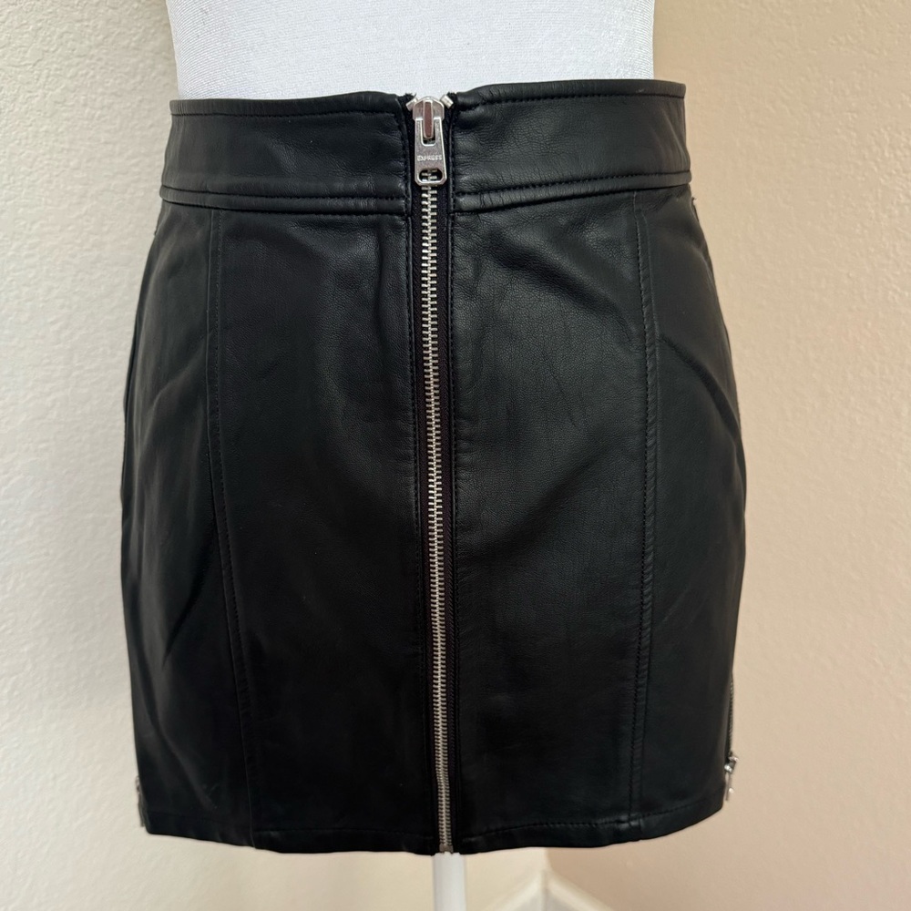 Black faux leather skirt with silver zippers